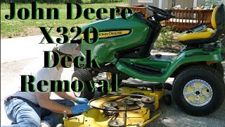 Deck Removal John Deere X320 [upl. by Elrak]