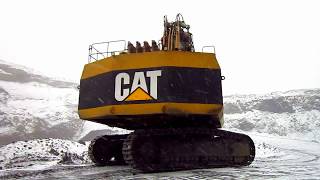 Caterpillar 5130 Loading Blasted Rock [upl. by Anawak]