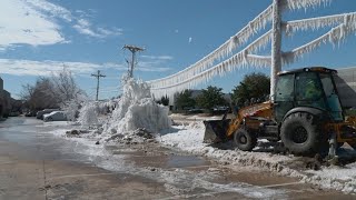 Carrollton water line bursts leaving frozen water and knocking out service to nearby residents [upl. by Aerbma]