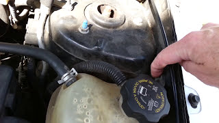 Windshield washer fluid pump working but no fluid clogged  how to fix  2005 Saturn Vue [upl. by Annawyt]