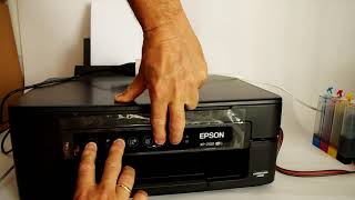 Comment faire votre imprimante Epson XP2100 XP2105 imprime avec cartouches sans puce [upl. by Aivatahs]