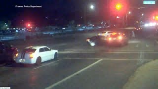 Car runs red light crashes narrowly misses family crossing street in Phoenix  ABC7 [upl. by Nuri]