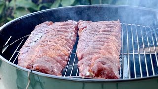 How to smoke BBQ ribs with the Slow N Sear and kettle  baby back or spareribs [upl. by Cogen754]