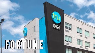 Tru Hotels Hilton Hotels’ New Cheaper Brand I Fortune [upl. by Edivad]