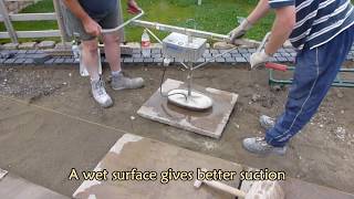 Using a vacuum lifter to lay flagstones [upl. by Elocel60]