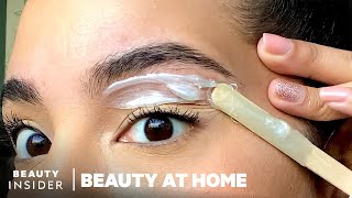 How To Wax Your Eyebrows Step By Step  Beauty At Home [upl. by Eilama]