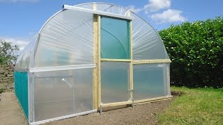 Polytunnel Construction  Building a Polytunnel  Polytunnel Installation  Covering a Polytunnel [upl. by Saeger]