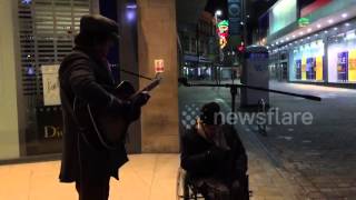 Homeless man joins busker in amazing spontaneous street jam [upl. by Siloa]