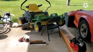 John Deere Z355E Yearly Maintenance How To Change Mower Blades amp Oil [upl. by Nayhr972]