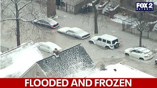 Flooded Detroit neighborhood freezes over after water main burst [upl. by Dulce]