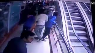 Baby dies after falling from mothers arms on escalator [upl. by Joane732]