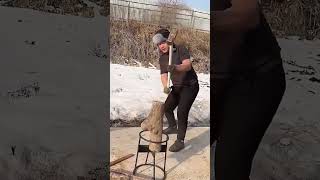 Firewood splitting process with hammer and simple iron rack [upl. by Suoirad]