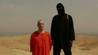 ISIS video appears to show beheading of US journalist [upl. by Arbmik]