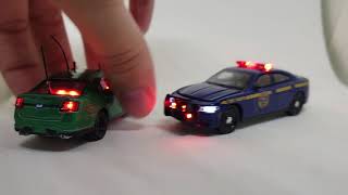 Custom LED Greenlight Dodge Charger Police 164 scale [upl. by Eerpud156]