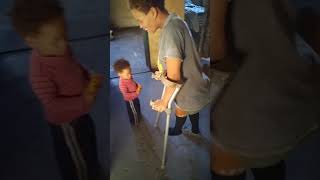 Shortleg African girl trying crutches [upl. by Argent]