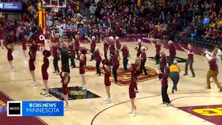 Senior citizen dancers wow soldout college basketball crowd [upl. by Eskill]