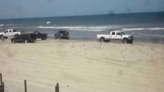 Chevy Tahoe or Suburban gets pulled out of sand by Ford F350 Diesel OBX [upl. by Nylg175]