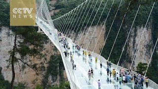 Tourists in China horrified as glass bridge cracks [upl. by Ignacia549]