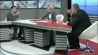 Políticos saem no tapa em programa de TV na Geórgia [upl. by Adnohsirk]