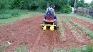 Wheel Horse C160 running a home made bedforming plow 1 of 3 [upl. by Airdnala]