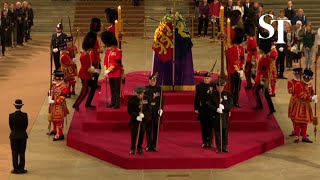 Moment royal guard collapses next to Queen’s coffin on first night of lying in state [upl. by Saleem39]