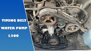 How To Change Timing BeltWater Pump  L200 K74 [upl. by Erdnua]