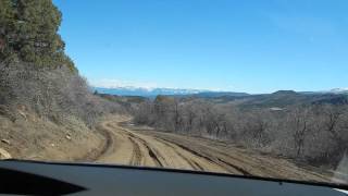 SR 330 E near Collbran Colorado driving down a muddy part of the road [upl. by Ominoreg]