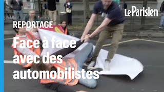 Boulogne des militants écologistes se collent les mains à la route et bloquent la circulation [upl. by Andromede]