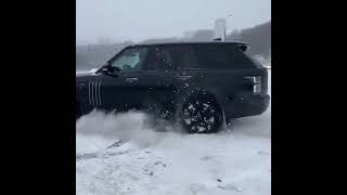 A Range Rover SVO does some crazy donuts in the snow [upl. by Cointon]