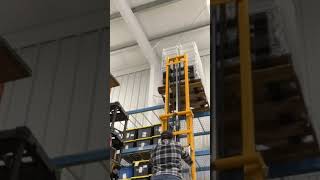 Lifting 120 Rental Company Chairs 11ft High With A Straddle Stacker forklift stackers [upl. by Eelessej]