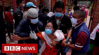 Families in Nepal forced to say goodbye through crematorium gates  BBC News [upl. by Mazurek]