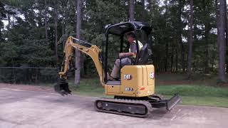 Retractable Undercarriage on the Cat® Mini Excavator [upl. by Oatis801]