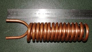 Winding double helix copper condenser coil PART 2 [upl. by Brnaby166]