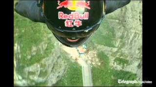 Amazing wingsuit stuntman Jeb Corliss soars through China mountains [upl. by Leahcimaj]