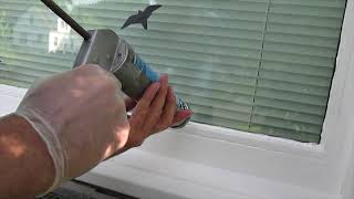 How to Glaze a Window using Silicone Caulk [upl. by Aaron]