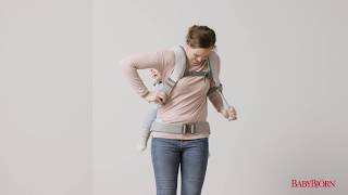 BABYBJÖRN  How to place your child on your back in Baby Carrier One [upl. by Yrred]