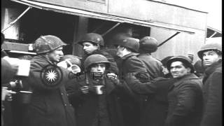 US paratroopers receive doughnuts and coffee from a Red Cross wagon in Holland HD Stock Footage [upl. by Itin]