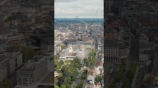 Vertical video Ghent Belgium Panorama of the central city from the air Cloudy weather summer [upl. by Aracaj]