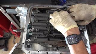 How to Install a Valve Body 700R4  4L60 [upl. by Aiket330]