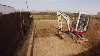 Digging out a base for a stable with a Takeuchi TB216 Digger Excavator [upl. by Dolf850]