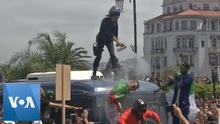 Algeria Police Toppled Off Of Van After Firing Tear Gas At Protesters [upl. by Errehs930]