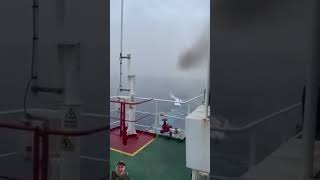 Safety crew blows up hijackers boat heading for cargo ship 🚢 boats explosion pirates ships [upl. by Ennad]