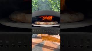 Cooking pizza unedited in the new Bertello SimulFIRE 16quot Rotating Outdoor Pizza Oven [upl. by Proffitt]