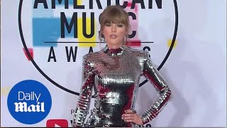 Taylor Swift commands attention on the 2018 AMAs red carpet [upl. by Oberon567]