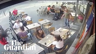 Woman shares footage of assault by street harasser at Paris cafe [upl. by Hsakaa]