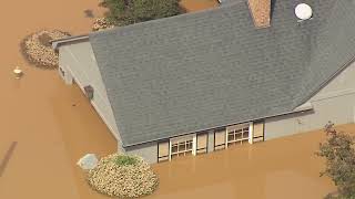 Aerials of flooding damage in Lake Lure North Carolina [upl. by Aerdnak]