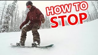 How To Stop On A Snowboard  Beginner Tips [upl. by Ennovehc627]