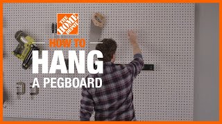 How to Hang a Pegboard  The Home Depot [upl. by Aneres]