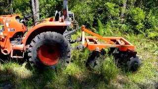 Landpride disc harrow on unbroken ground Kubota L2501 [upl. by Ahsinauj490]