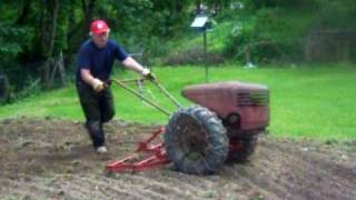 David Bradley Tractor at work With 4 Attachments [upl. by Hernardo]